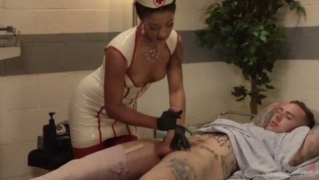 Busty black nurse Daisy Ducati checks dude's prostate and wanks his dick
