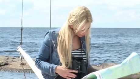 Lovely tanned blonde Lindsey B is masturbating her pussy on the yacht
